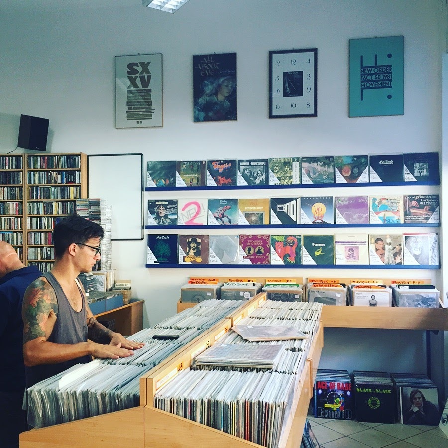 A collector browsing the racks in an independent record shop